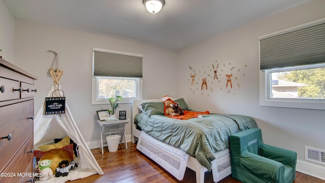 bedroom featuring dark wood-type flooring