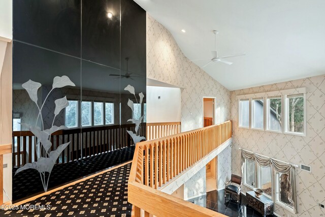 hallway with vaulted ceiling