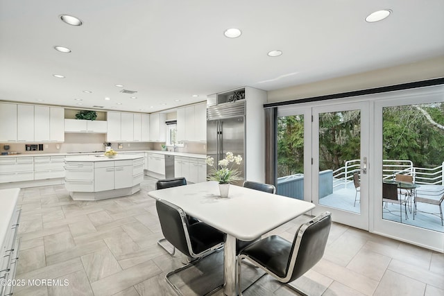 dining space featuring french doors