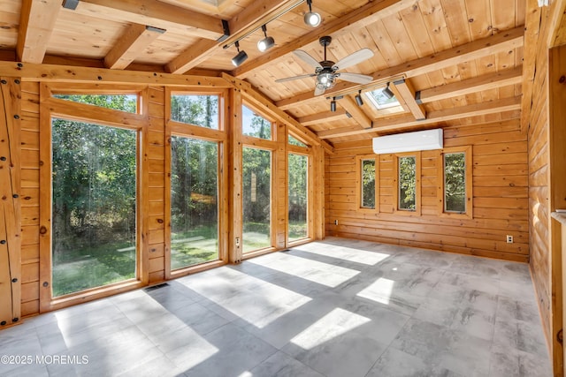 unfurnished sunroom featuring wooden ceiling, track lighting, vaulted ceiling with skylight, ceiling fan, and a wall mounted AC