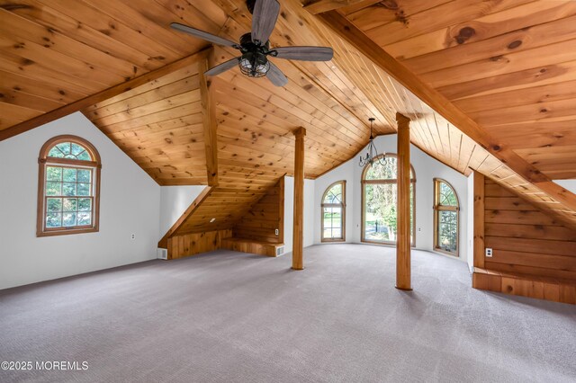 bonus room featuring wood ceiling, a wealth of natural light, and light colored carpet