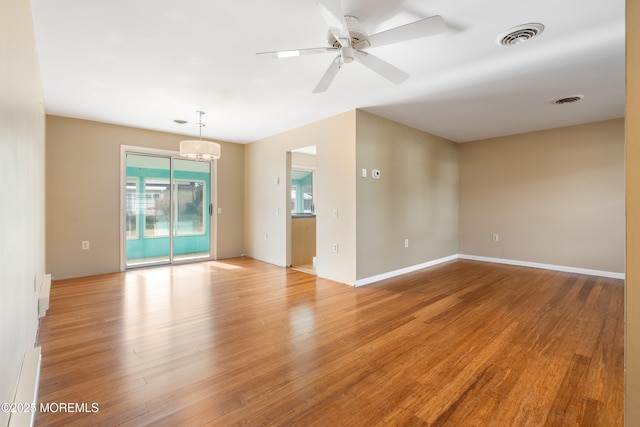 unfurnished room with ceiling fan and light hardwood / wood-style floors