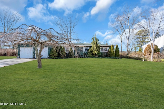 ranch-style house with a front lawn and a garage