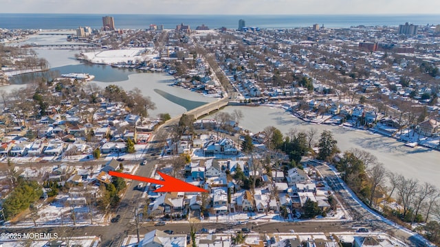 drone / aerial view featuring a water view