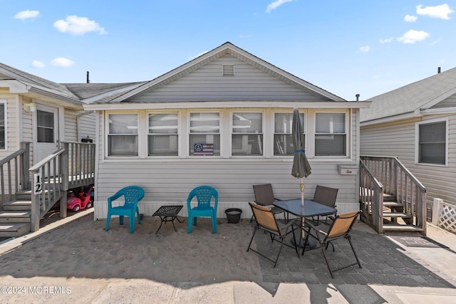 rear view of house featuring a patio area