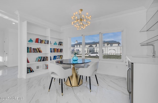 dining room featuring an inviting chandelier, sink, built in shelves, and ornamental molding