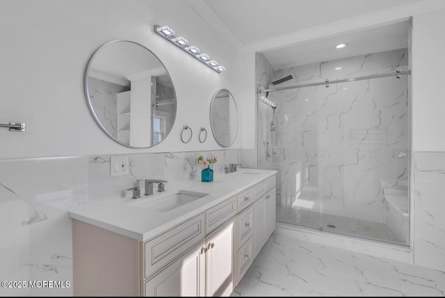 bathroom featuring vanity, tile walls, and walk in shower