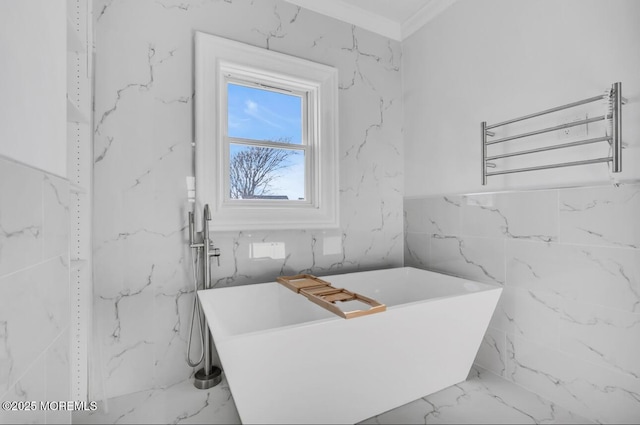 bathroom featuring crown molding, radiator heating unit, and a tub to relax in