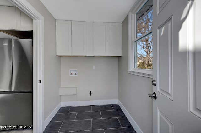 laundry room with cabinets and hookup for a washing machine