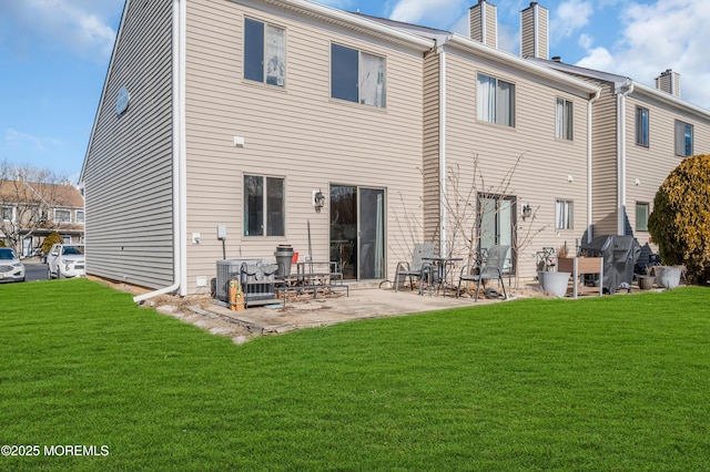 back of house with a yard, a patio, and central air condition unit