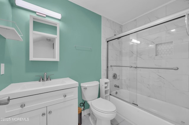 full bathroom with toilet, combined bath / shower with glass door, and vanity