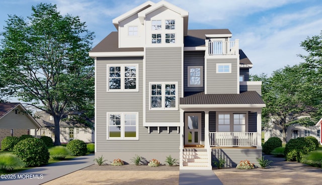 view of front of property featuring covered porch, metal roof, and a balcony