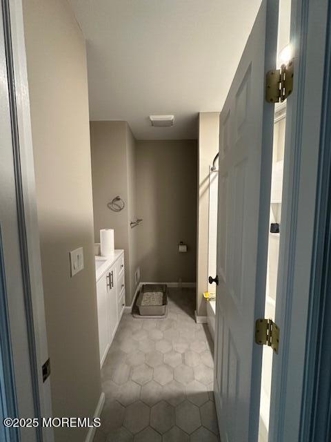 122 Orchid Ct Unit 1202, Toms River, NJ 08753 - full bathroom with tub / shower combination, vanity, tile patterned floors, and baseboards