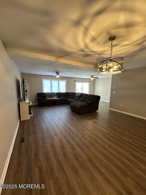122 Orchid Ct Unit 1202, Toms River, NJ 08753 - living room featuring a ceiling fan, dark wood-type flooring, and healthy amount of natural light