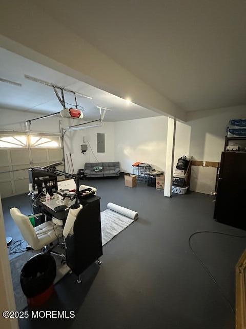 122 Orchid Ct Unit 1202, Toms River, NJ 08753 - garage with electric panel and a garage door opener
