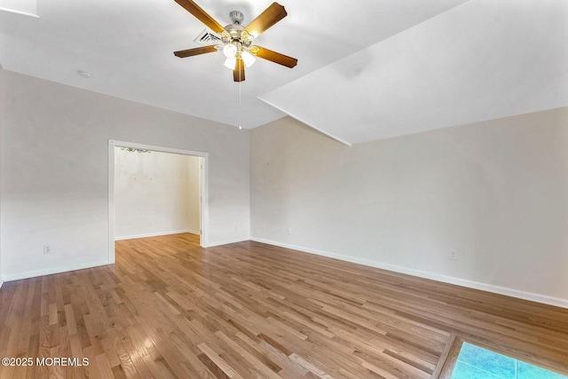 spare room with ceiling fan and light hardwood / wood-style floors