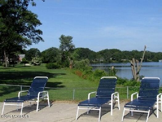 view of patio / terrace featuring a water view