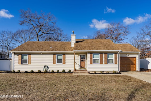 single story home with a front lawn and a garage