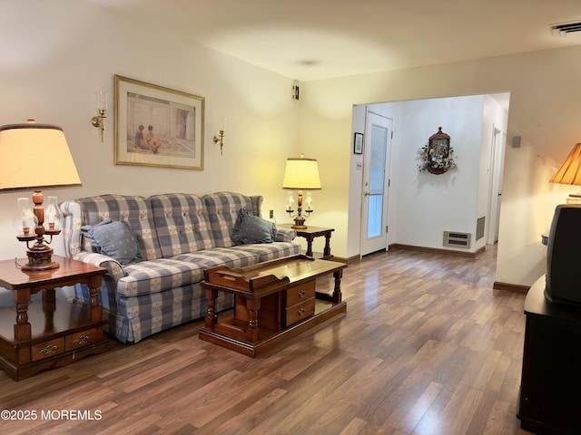 living room featuring dark hardwood / wood-style flooring