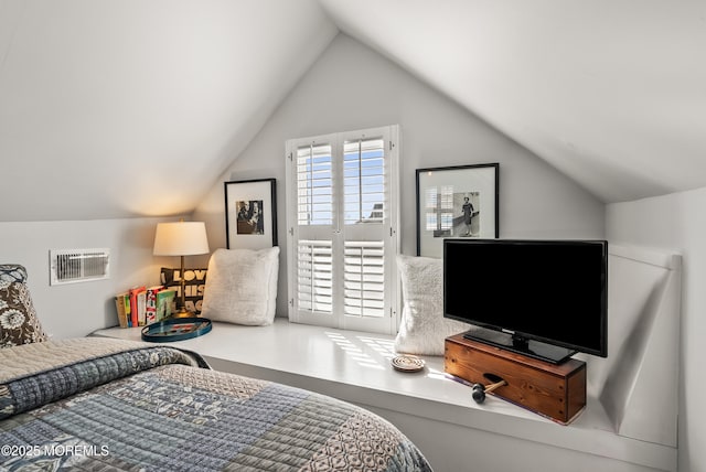 bedroom with access to outside, visible vents, and vaulted ceiling