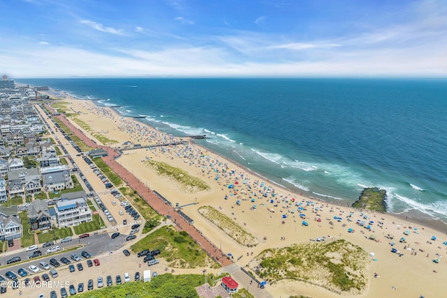 aerial view featuring a beach view and a water view