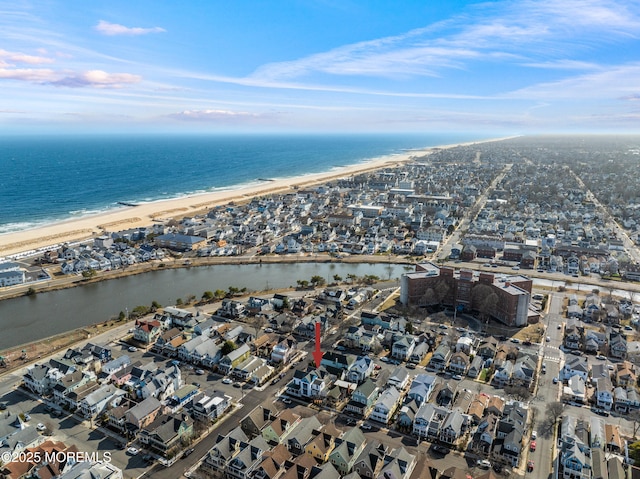 aerial view with a water view and a residential view