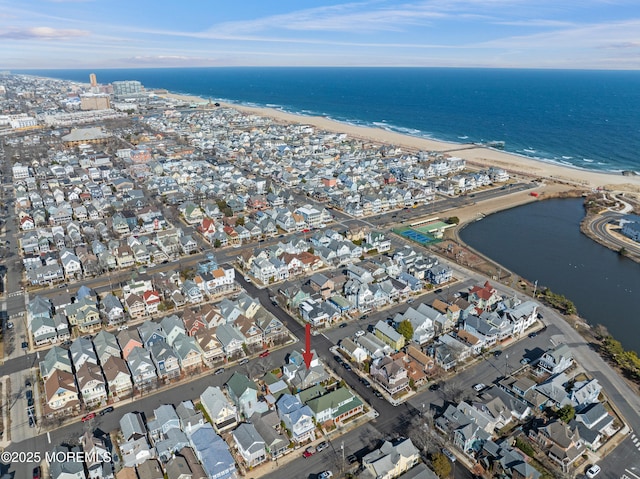 aerial view with a water view and a residential view