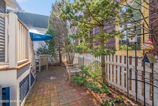 view of patio with fence