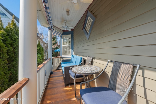 balcony featuring ceiling fan and covered porch