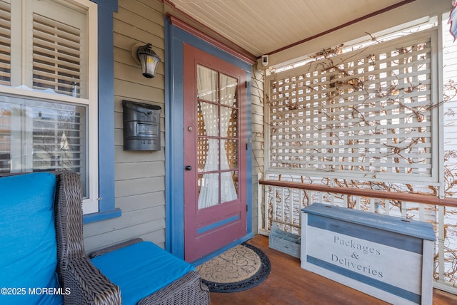 property entrance featuring covered porch