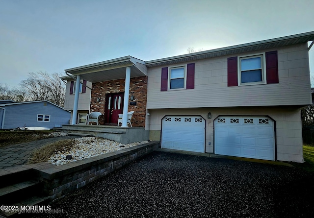 bi-level home featuring a garage