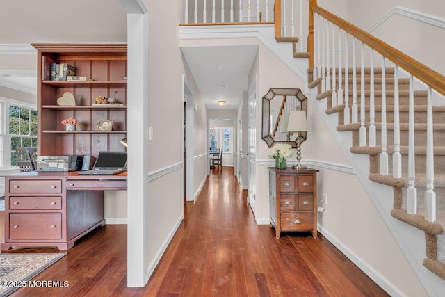 corridor with dark hardwood / wood-style floors