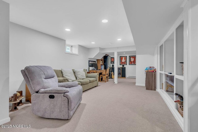 carpeted living room featuring baseboard heating