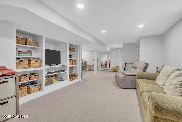 carpeted living room with built in shelves