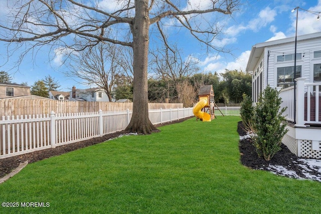 view of yard with a playground