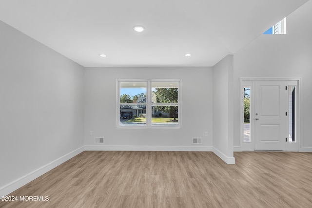 entrance foyer with light wood-type flooring