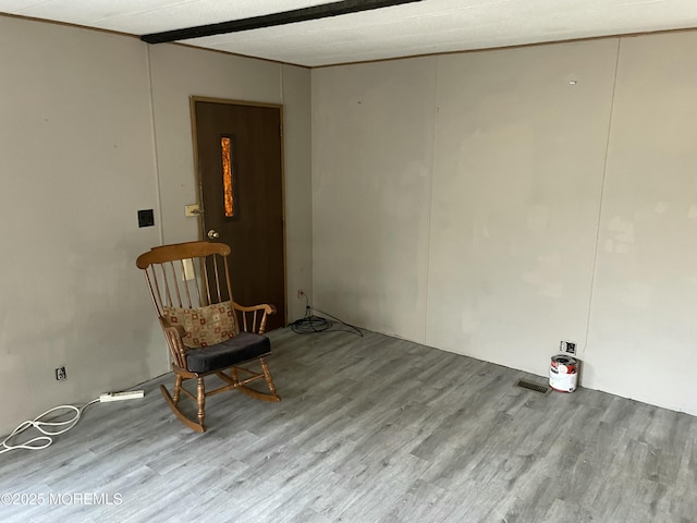 unfurnished room featuring wood finished floors