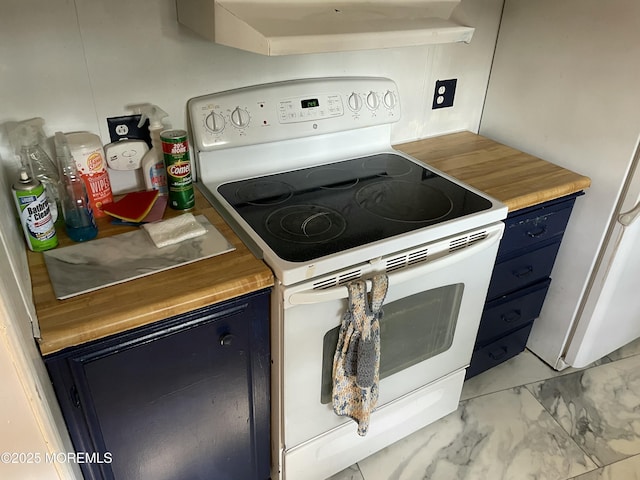 kitchen with marble finish floor, blue cabinetry, butcher block countertops, and white electric range oven