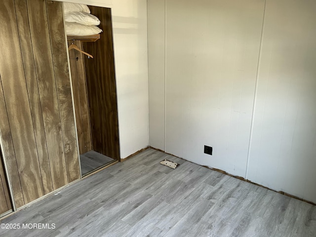 empty room featuring wood finished floors