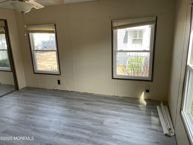 empty room with wood finished floors