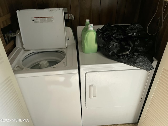 laundry room featuring laundry area and separate washer and dryer