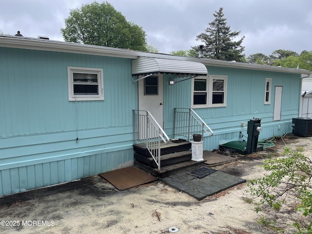 12 Pigeon Ct, Whiting, NJ 08759 - rear view of house featuring cooling unit
