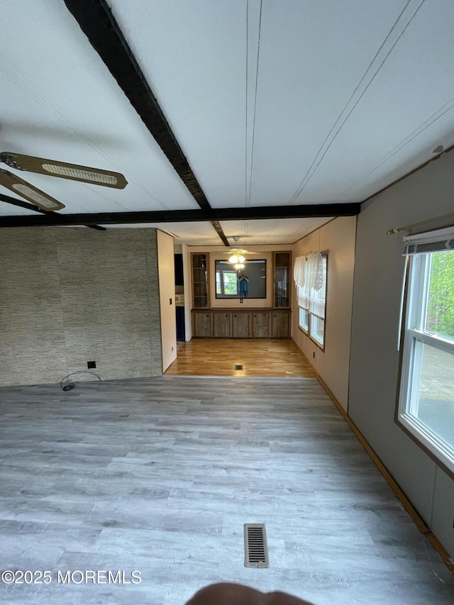 12 Pigeon Ct, Whiting, NJ 08759 - unfurnished living room featuring visible vents, a ceiling fan, and wood finished floors
