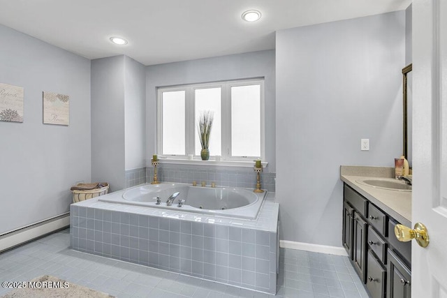 bathroom featuring tile patterned floors, vanity, a baseboard radiator, and a relaxing tiled tub