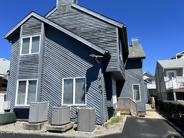 view of property exterior featuring central air condition unit