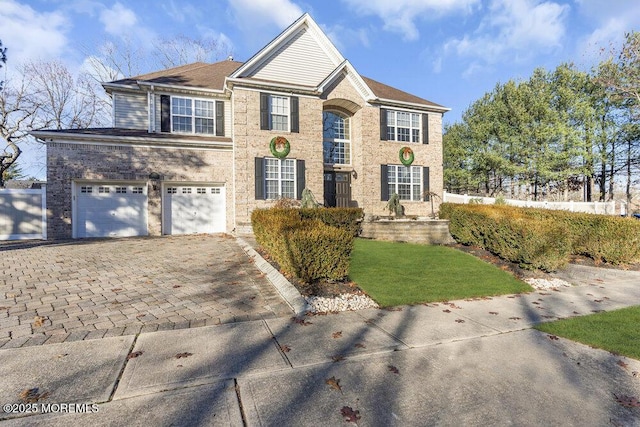 front of property featuring a garage