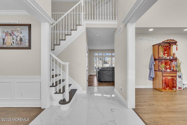 foyer with crown molding