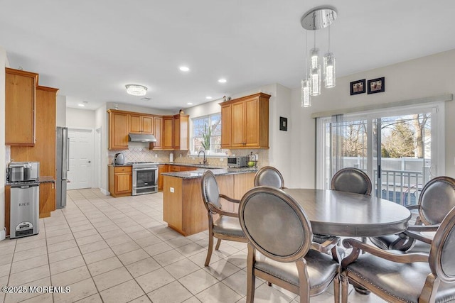 tiled dining area with sink