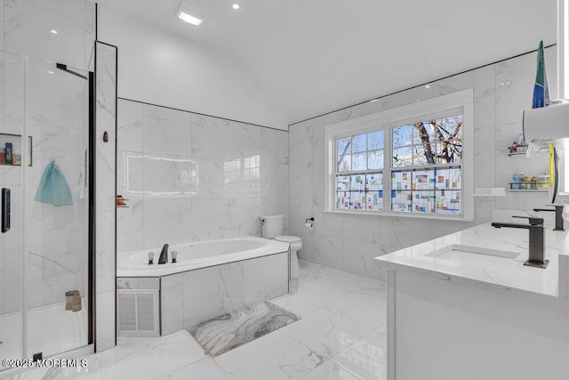 full bathroom with toilet, shower with separate bathtub, vaulted ceiling, tile walls, and vanity