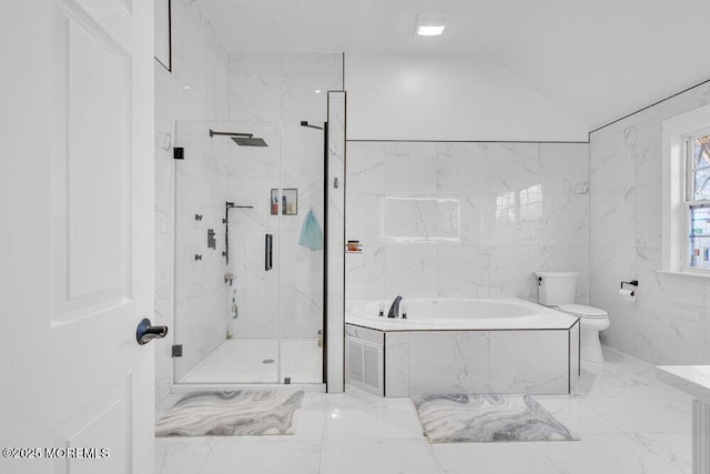 bathroom with toilet, separate shower and tub, and tile walls